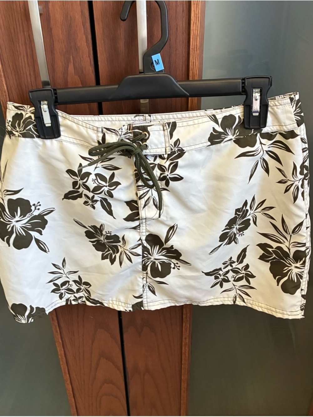 Floral Drawstring Mini Swim Skirt in Olive Floral on Cream.